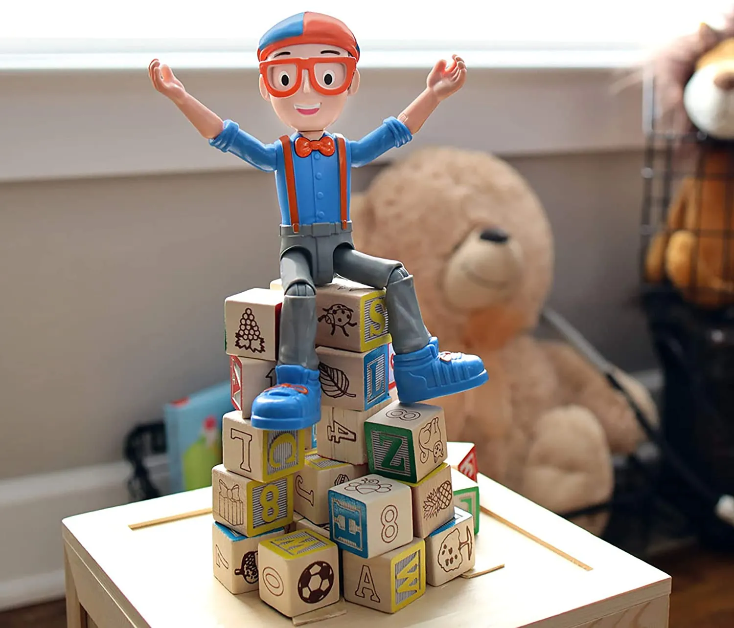 Blippi Talking Figure, 9-inch Articulated Toy with 8 Sounds and Phrases, Poseable Figure Inspired by Popular YouTube Edutainer