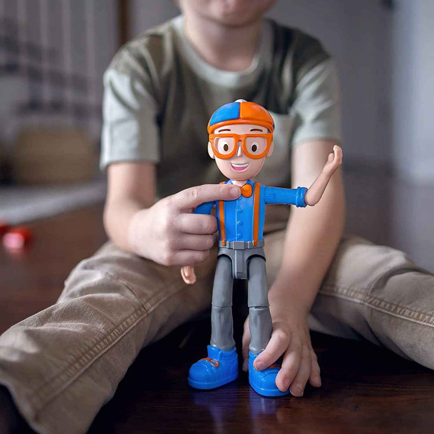 Blippi Talking Figure, 9-inch Articulated Toy with 8 Sounds and Phrases, Poseable Figure Inspired by Popular YouTube Edutainer